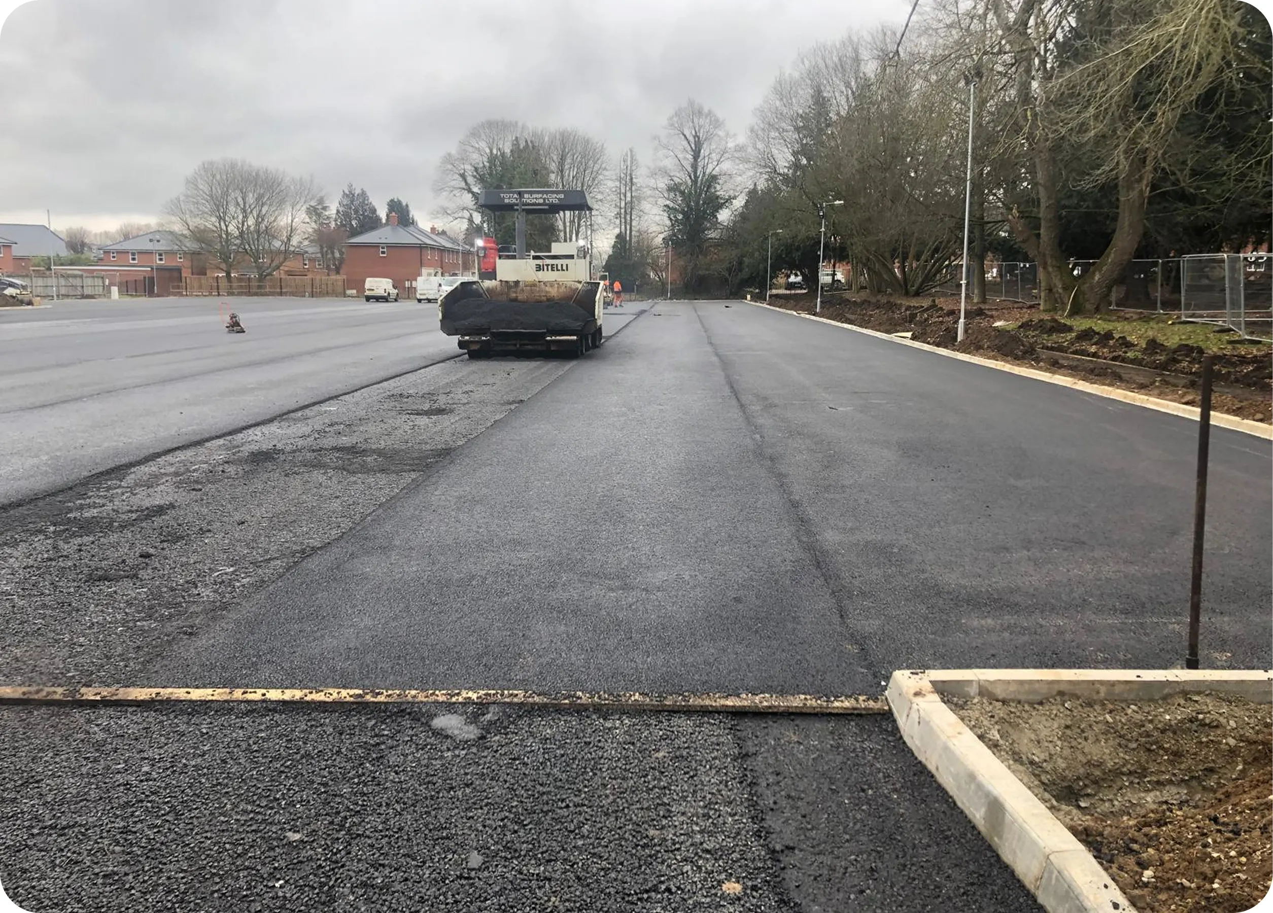 Paver laying a new tarmac road