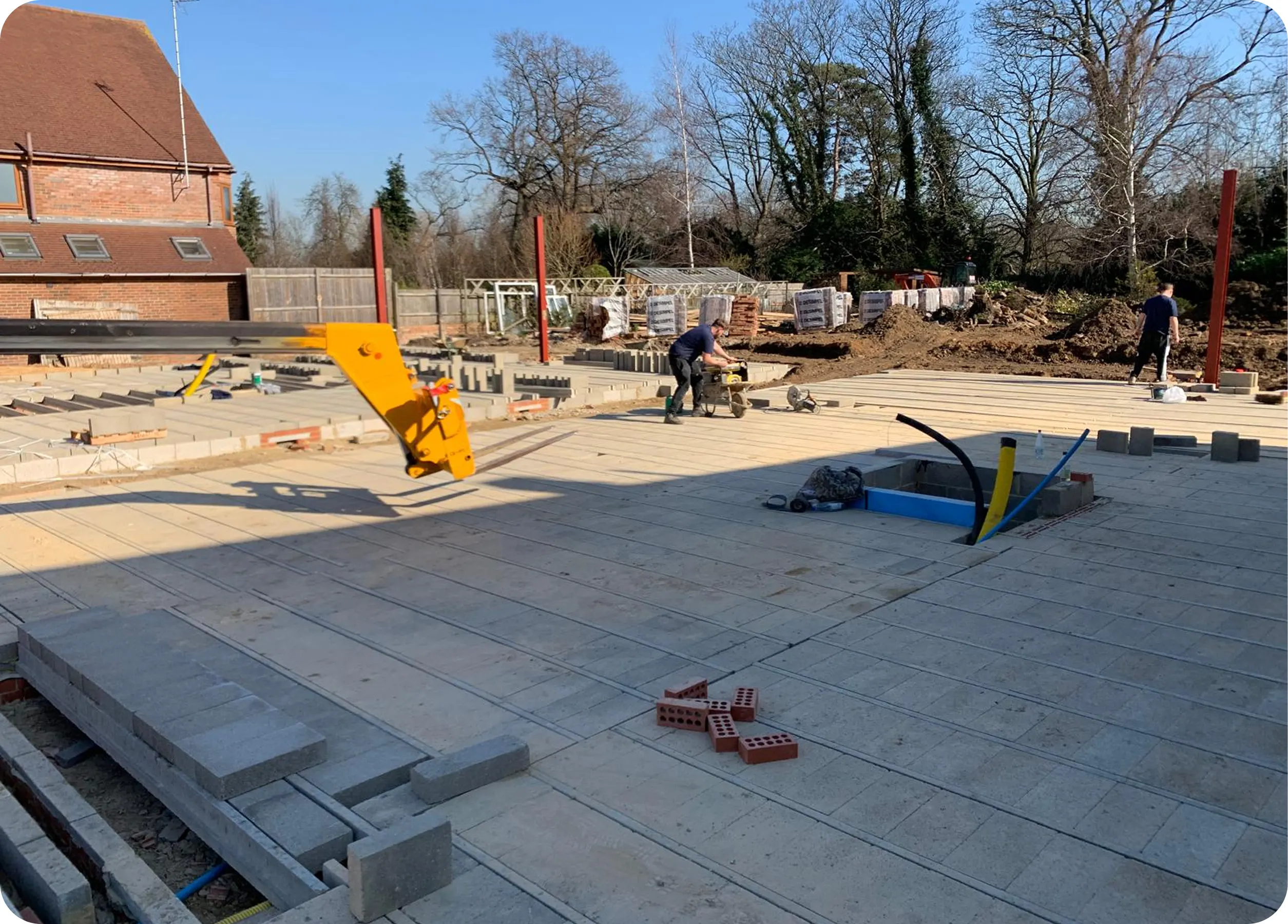 Oversite floor being screeded on a new-build plot